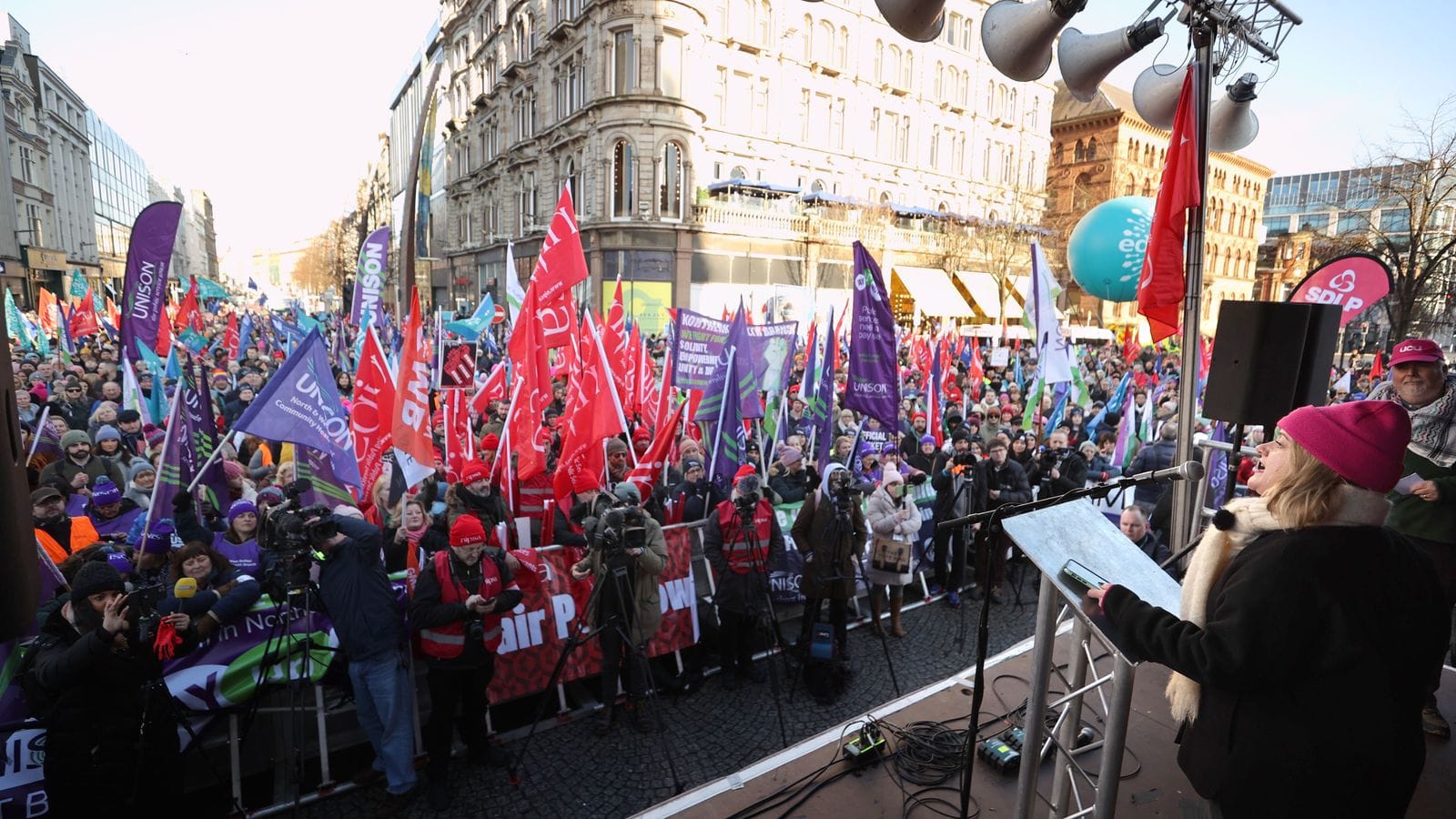 150,000 public sector workers walk out in Northern Ireland's biggest strike in recent history