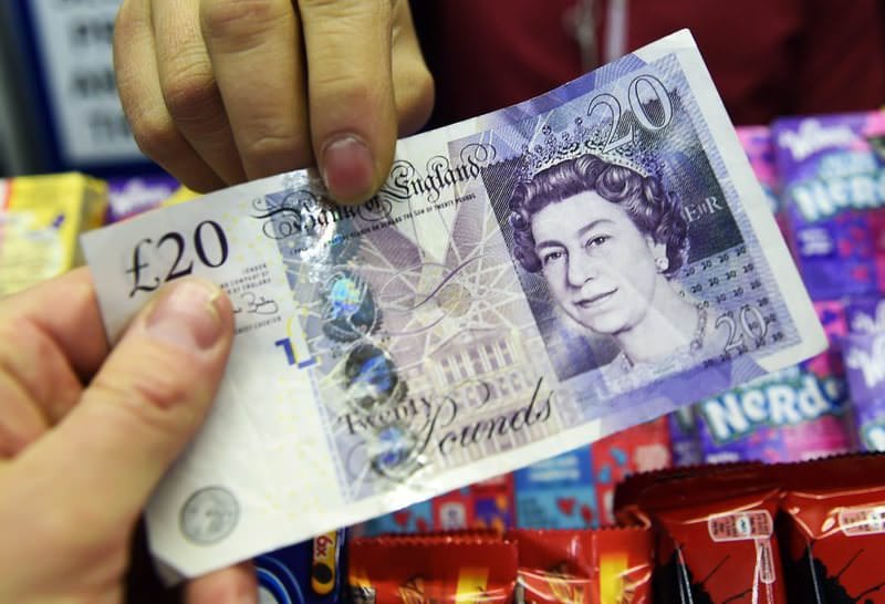 UK economy grows in Feb, shows signs of exiting recession