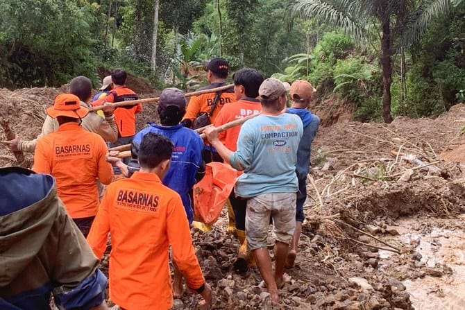 Landslides hit Indonesia’s Sulawesi island, killing at least 18 people