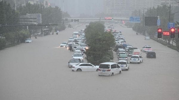 Storms in southern China kill four, thousands evacuated