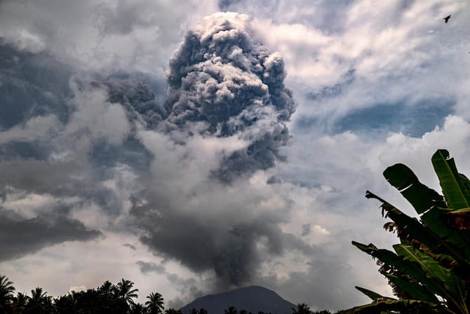 Indonesia’s Mount Ibu erupts as disaster agency warns of possible floods, cold lava flow