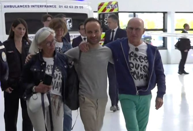 French citizen Louis Arnaud held in Iran arrives in Paris
