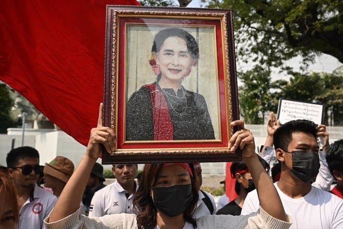 Myanmar authorities arrest 22 for marking Suu Kyi’s birthday: media