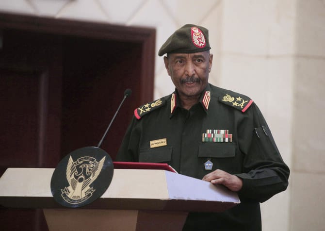 Sudan’s military says its top commander survived a drone strike that killed 5 at an army ceremony