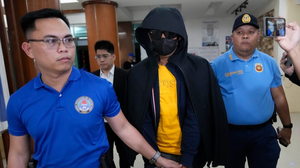Philippine officials say suspect in the killings of 2 Australians and a Filipino has surrendered