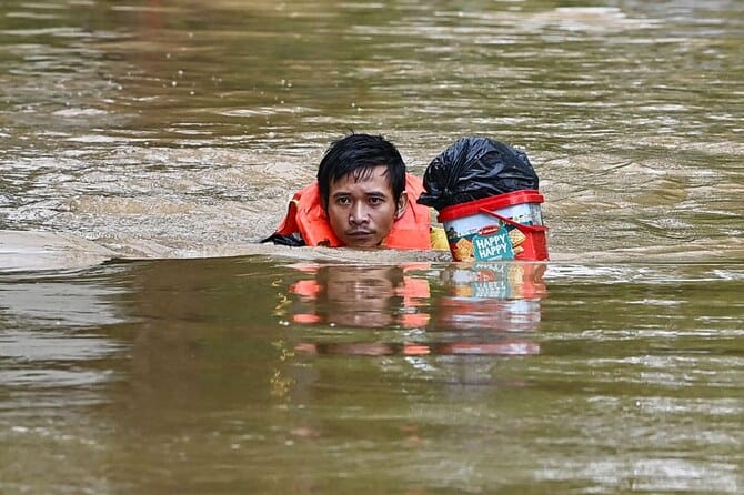 Floods inundate north Vietnam as Typhoon Yagi death toll climbs