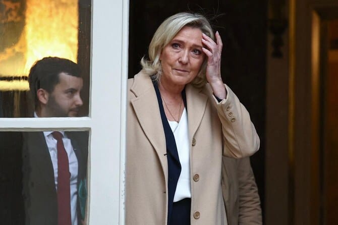 Le Pen threatens to topple French government over budget