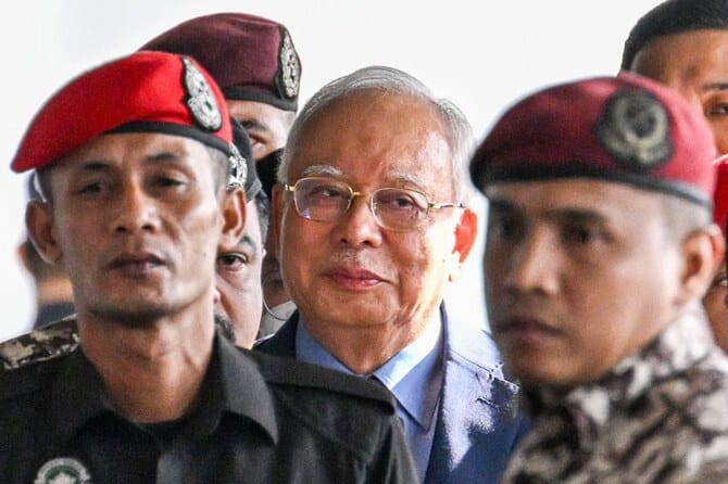 Malaysian court drops one of the graft cases against jailed former premier Najib Razak