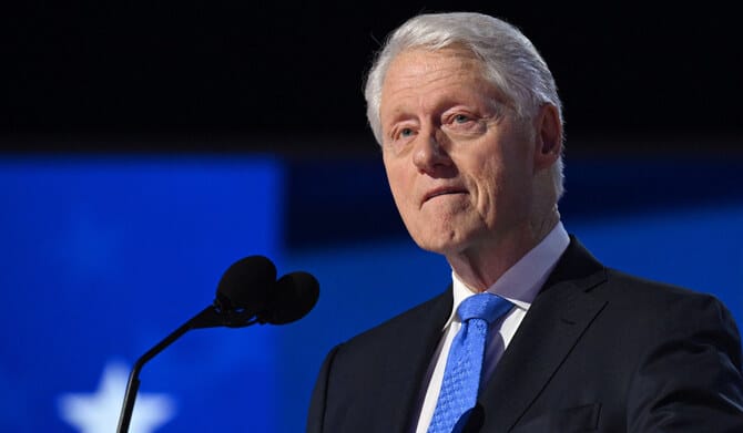 Bill Clinton is hospitalized with a fever but in good spirits, spokesperson says