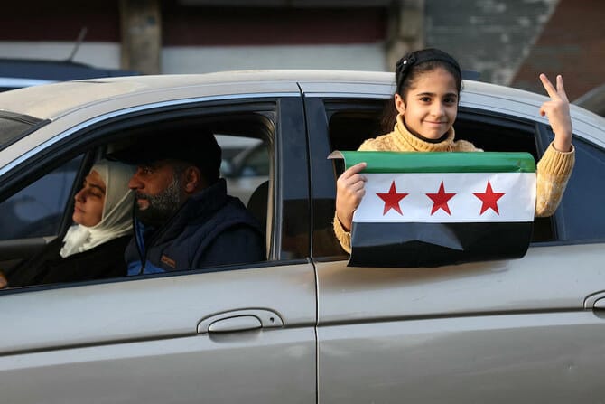 Syria’s new government says to suspend constitution, parliament for three months