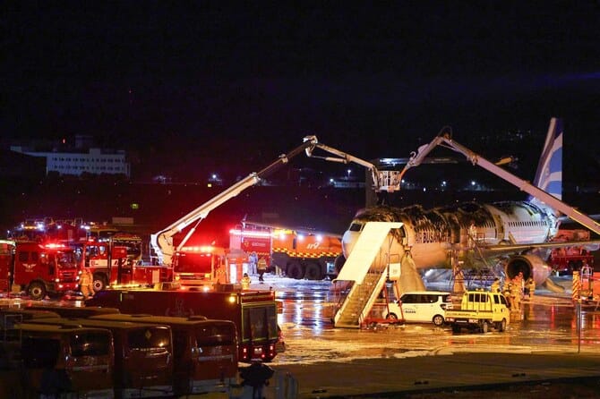 Passenger plane catches fire at South Korean airport. All 176 people on board are evacuated