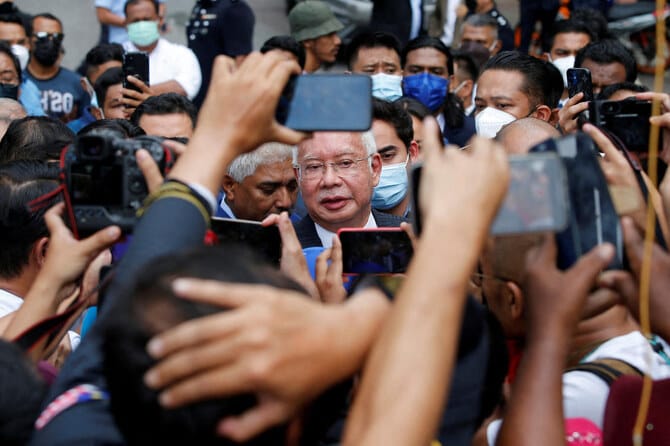 Malaysia seeks gag order on talk of jailed ex-PM’s bid to reveal royal document