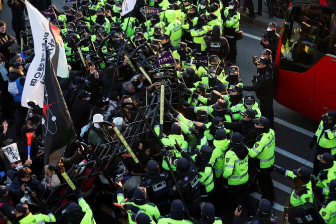 South Korea in political crisis after impeached president resists arrest