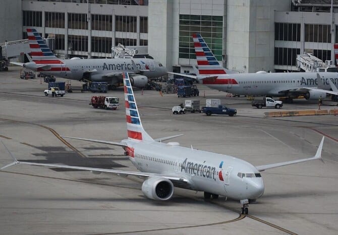 Passenger jet with 64 aboard collides with Army helicopter while landing at Reagan Airport near DC