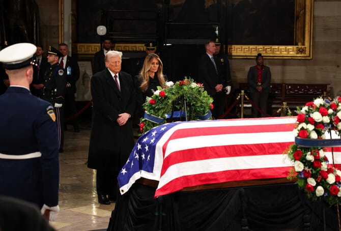 President-elect Donald Trump visits Jimmy Carter’s casket in Capitol Rotunda after criticizing him