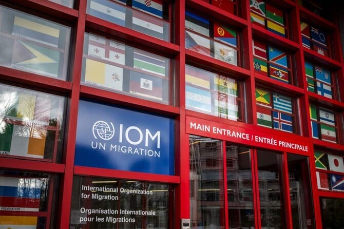 Angered by mass-layoffs, UN migration agency staff demand member states step in