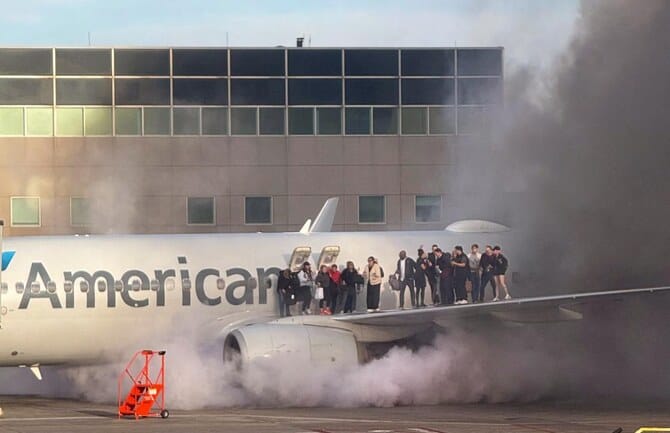 Fire aboard US airliner after diverted to Denver, 12 injured