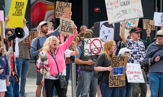 Protesters rebelling against Elon Musk’s purge of US government swarm Tesla showrooms