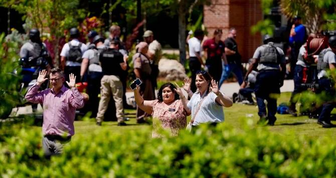 Two killed as police officer’s son opens fire at US university