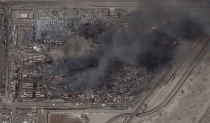 Iran fire contained after blast at key port; 70 killed