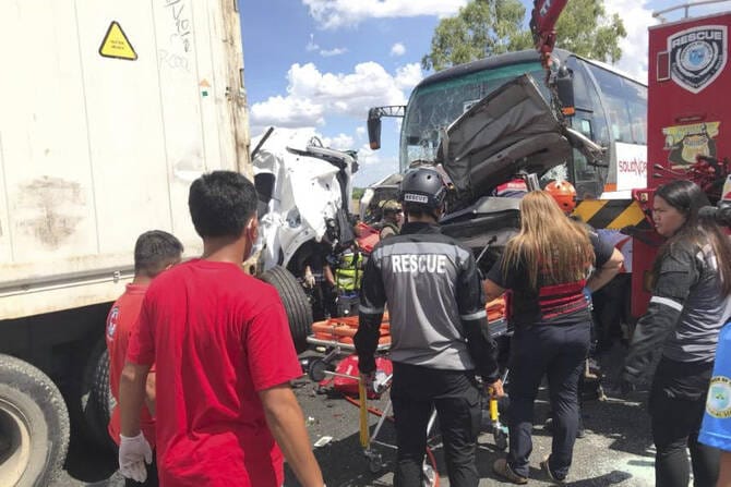 10 killed in Philippines when passenger bus slams into vehicles at a toll booth
