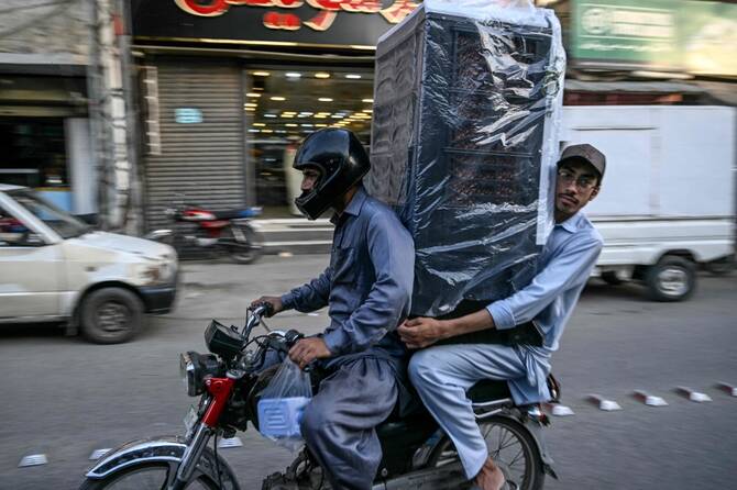 At least 14 killed in Pakistan storms after heatwave