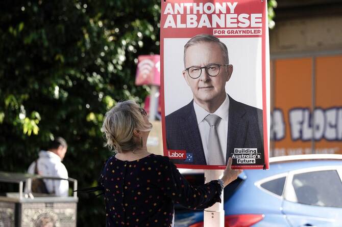Australian PM says battle ahead to win election