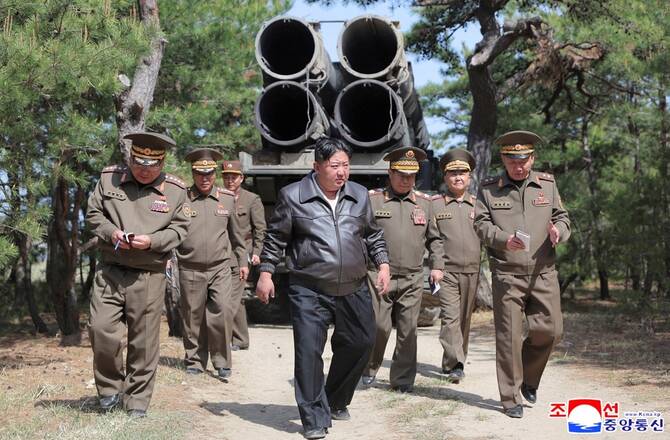 North Korea says leader Kim supervised missile tests simulating nuclear strikes against rivals