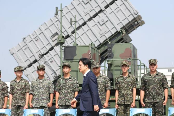 Taiwan says ‘willing’ to talk to China as island boosts defenses