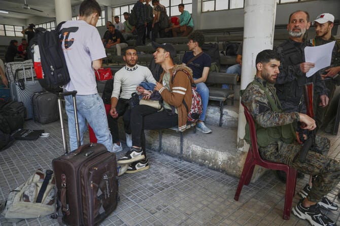 Syria’s Druze take up arms to defend their town against Islamists