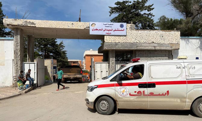 At least 58 corpses found in Libyan hospital, ministry says