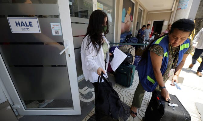 US sends 68 migrants back to Honduras and Colombia in first voluntary deportation
