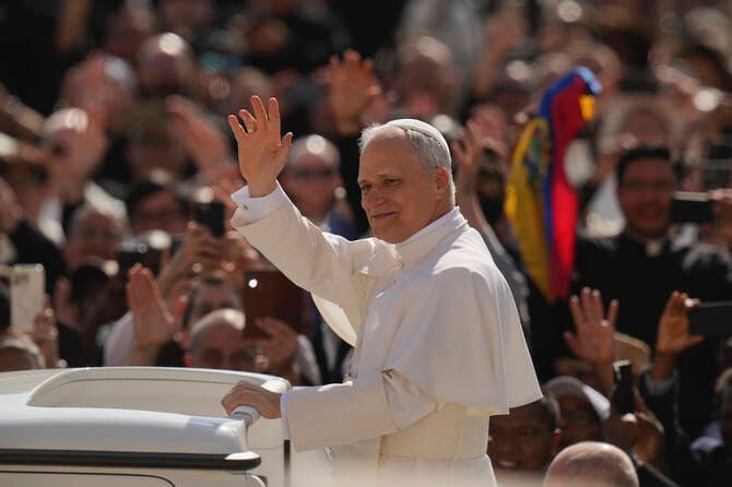 Pope Leo XIV takes his first popemobile ride through St. Peter’s Square ahead of installation