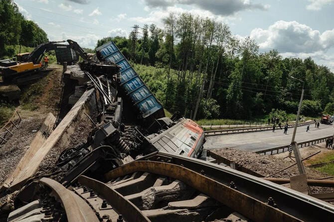 Explosions caused 2 bridges in western Russia to collapse, officials say