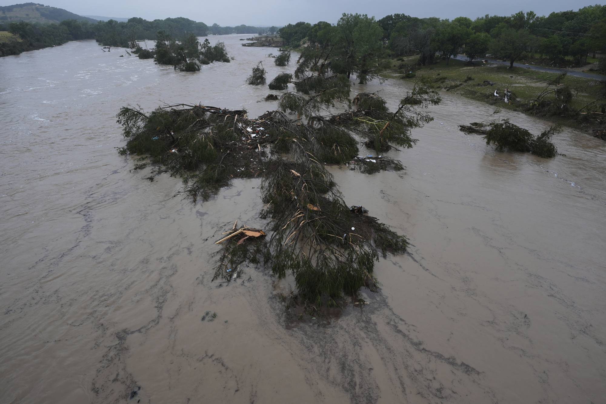 About 24 dead in Texas floods and more than 20 children missing from a girls summer camp