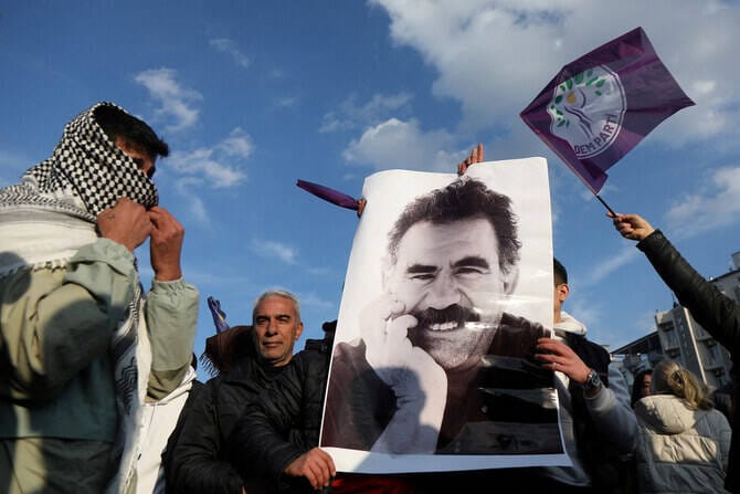 Kurdish fighters in northern Iraq to hand over weapons in first step toward disarmament