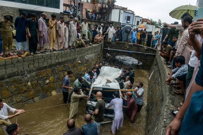 Landslide, heavy rain in Pakistan sweeps away cars, killing 3