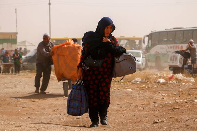Nearly 450,000 Afghans left Iran since June 1: UN migration agency