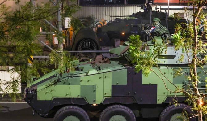 Japan warns of China’s military moves as biggest strategic challenge