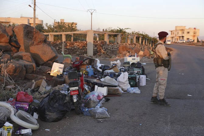 Syria announces ceasefire after sectarian clashes, but more fighting and abuse alleged