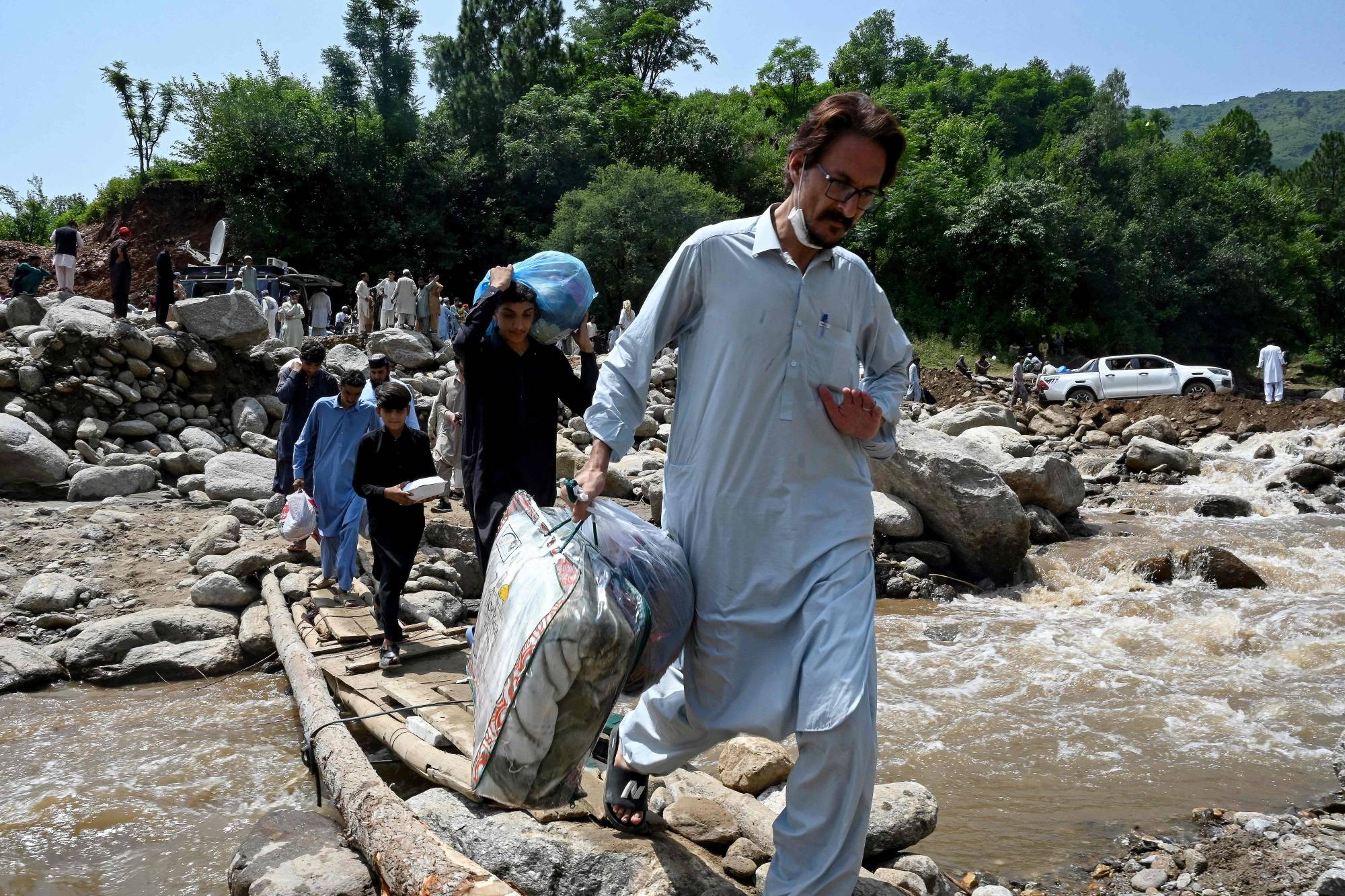 Over 150 people are still missing after devastating flooding in northwest Pakistan