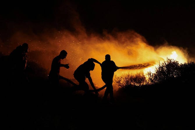 Firefighters battle blaze near Athens for second day