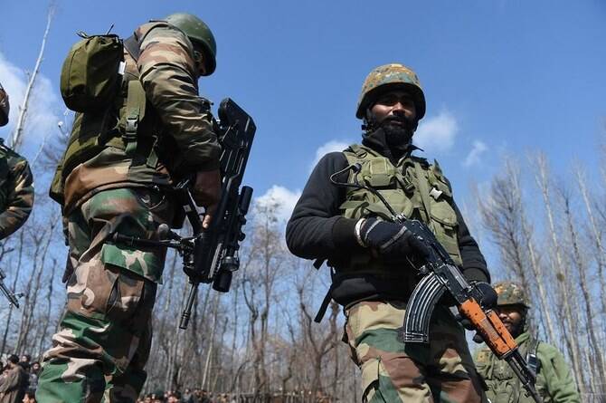 2 Indian soldiers and a suspected militant are killed in a drawn-out gunfight in Kashmir