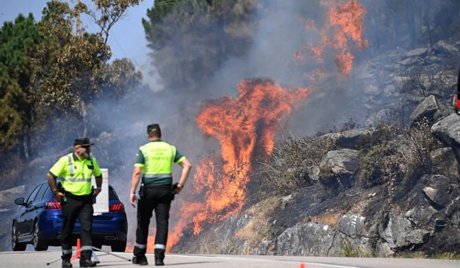 Spain’s deadly wildfires ignite political blame game