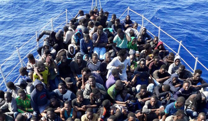 Libya’s coast guard shoots at a vessel seeking to rescue migrants in distress, group says
