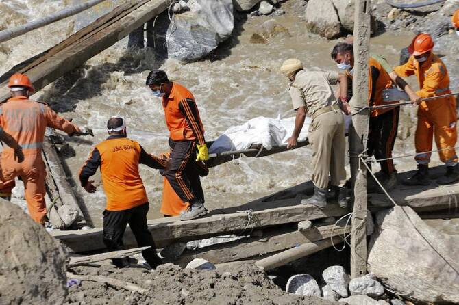 Flash floods leave 32 dead in Indian-controlled Kashmir as over 150,000 are displaced in Pakistan