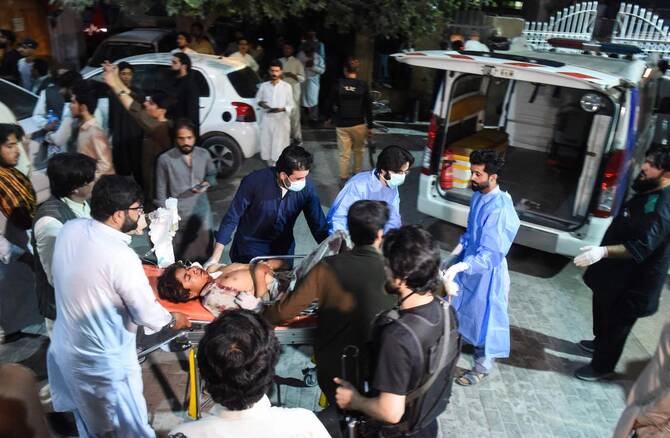 A suicide bombing near a political rally in southwestern Pakistan kills 13 and wounds 30