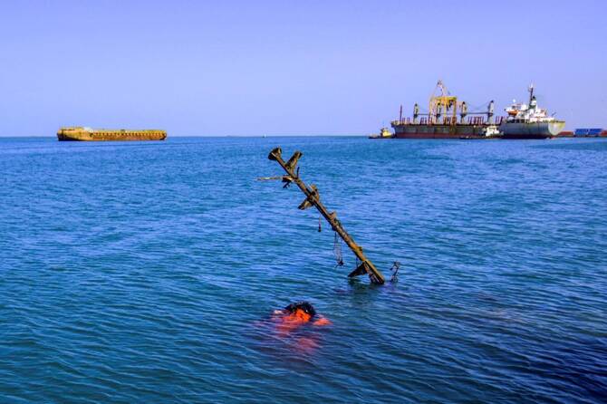 Suspected attack by Yemen’s Houthis targets ship in Red Sea after missiles fire on Israel