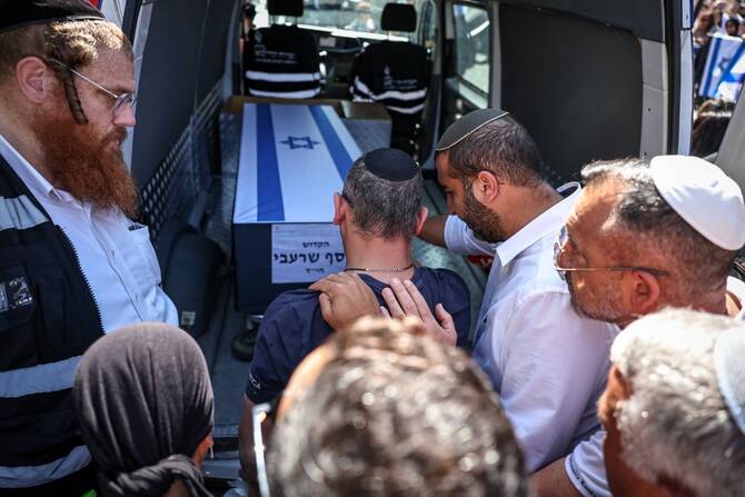 Hamas to return hostage body as families urge pause to Gaza truce