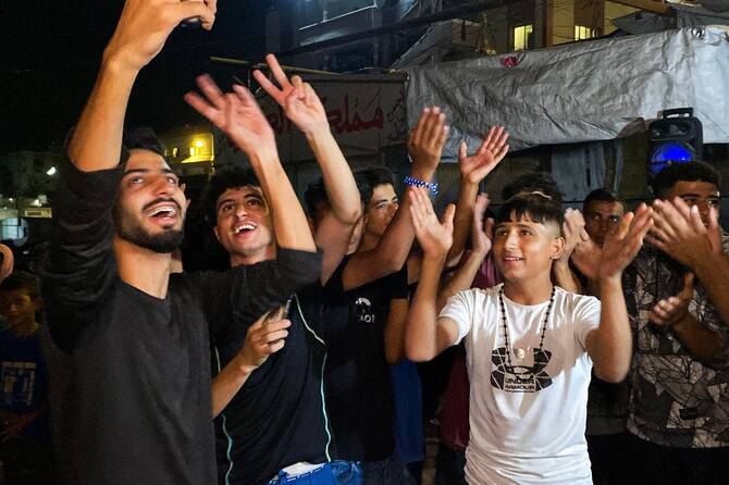 Celebrations erupt in Gaza and Israel at news of deal to end two-year war